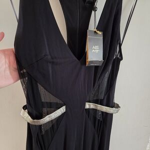 ABS brand , black, mermaid style dress. Size medium.